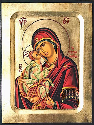 WOODEN ICON CARVED WITH GILDING